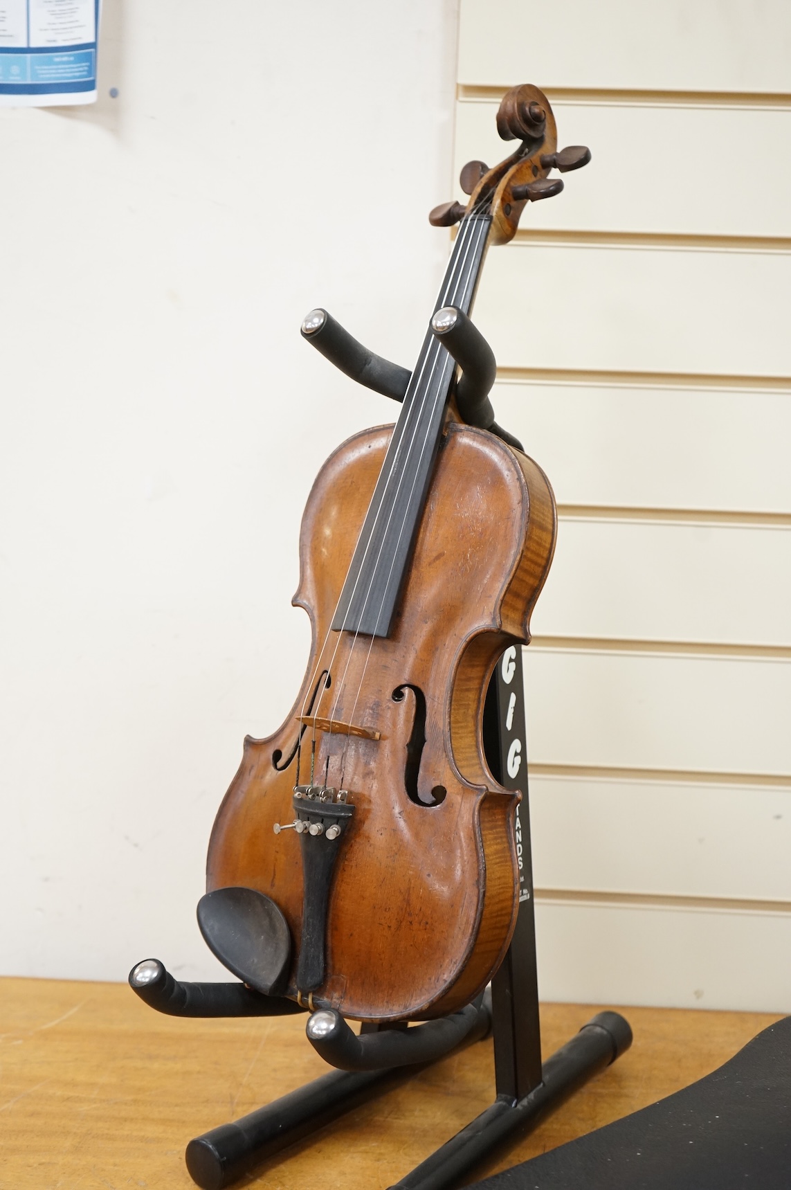 A late 18th century cased English violin, possibly after Richard Duke, length of body 35.5cm.